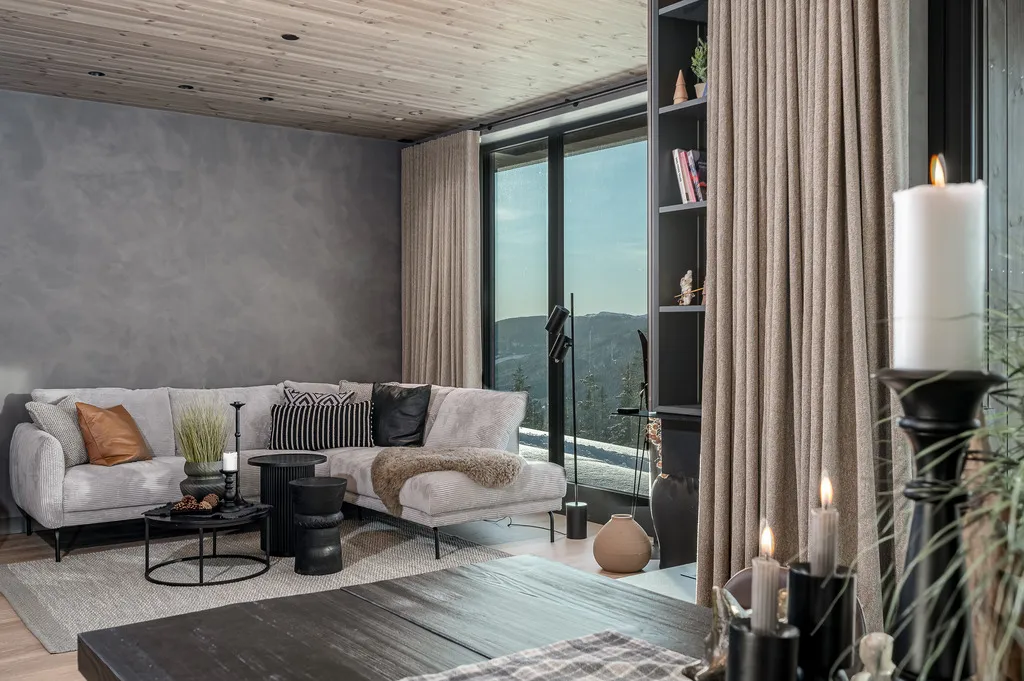 Apartment A11, Kvitfjell, Norway: living room seating viewed from the dining area