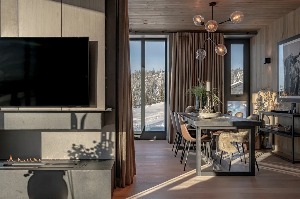 Apartment A11, Kvitfjell, Norway: dining area beside the fireplace and large windows